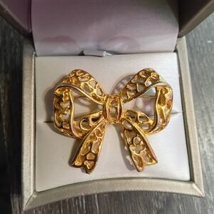 Elegant Gold Toned Bow Brooch